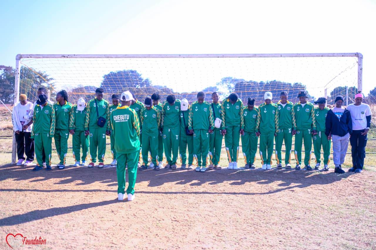 The squad lined up across the goalmouth before a match