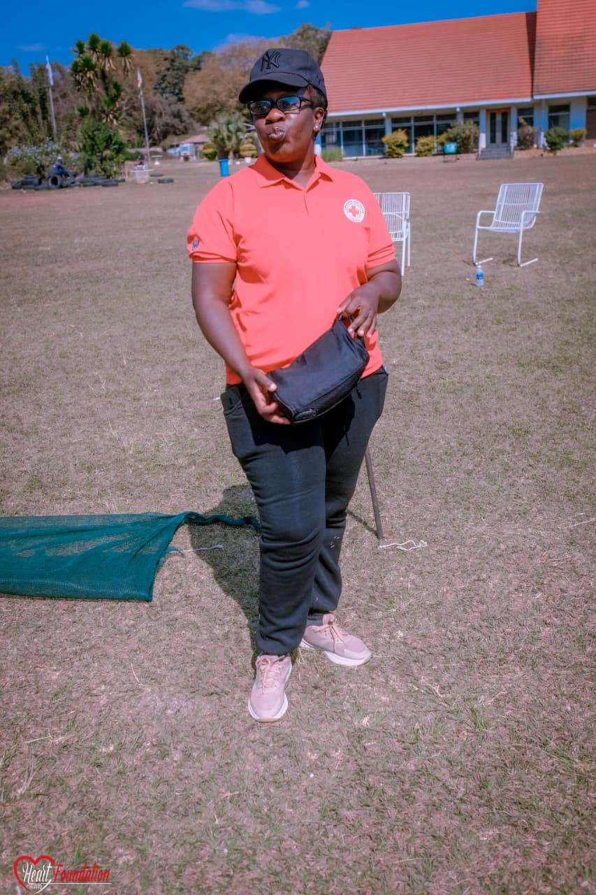 A club representative at a community event on the field